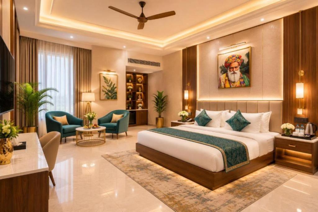 a hotel room with a bed and some chairs at Hotel Airport Hilton Sky IGI Delhi Airport Terminal 3 With- Free Airport Pickup in New Delhi