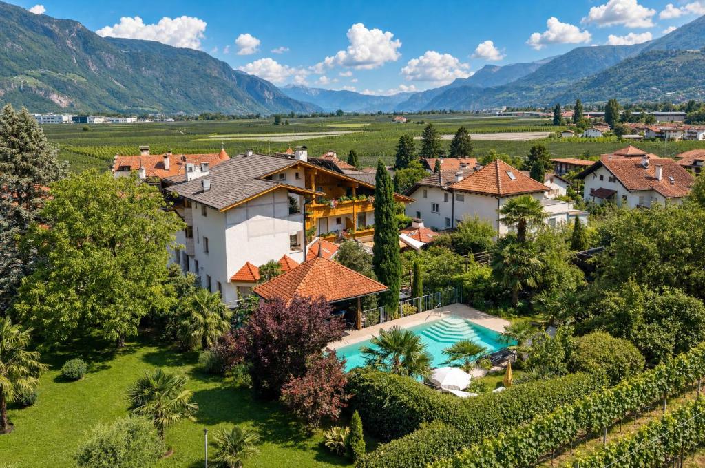 an aerial view of a villa with a swimming pool at Hotel FleurAlp in Cermes