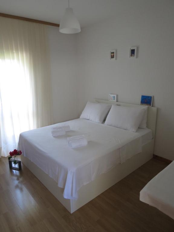 Postel nebo postele na pokoji v ubytování SD House Rooms
