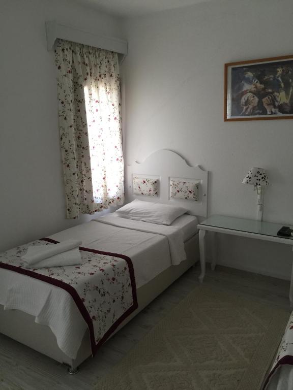 Postel nebo postele na pokoji v ubytování Pasha Motel