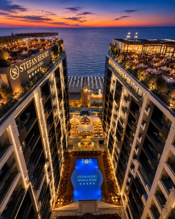 a view from the top of a cruise ship at night at Stefan Resort Mamaia Nord in Mamaia Sat/Năvodari