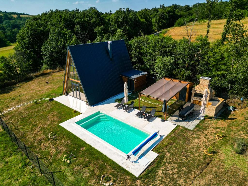 an overhead view of a swimming pool and a gazebo at KosMy dream in Sopot
