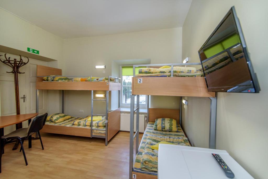 Postel nebo postele na pokoji v ubytování Hostel Filaretai