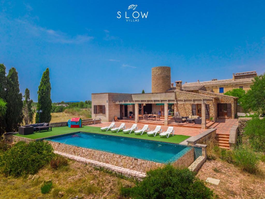 an image of a villa with a swimming pool at Villa Son Bennasar by Slow Villas in Felanitx