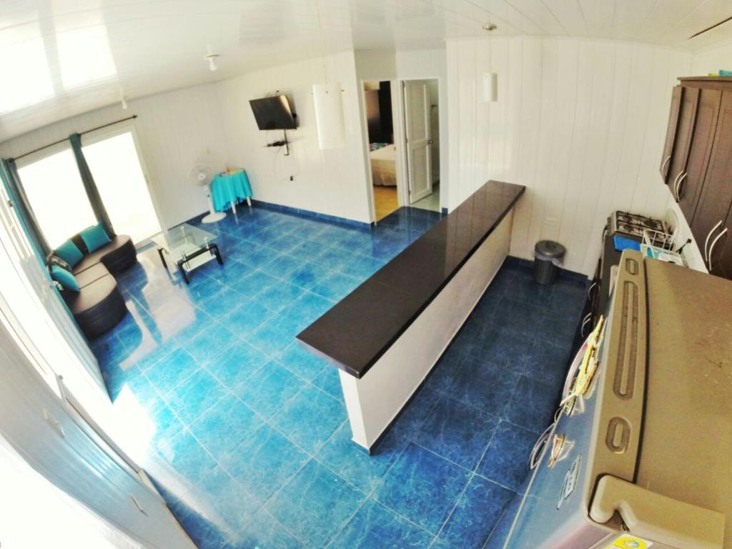 TV a/nebo společenská místnost v ubytování Zippy´s Sea View Apartments