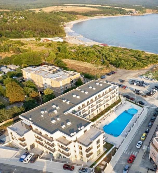 an aerial view of a hotel and the beach at COSTA AZZURRA Apartments FREE PARKING in Ahtopol