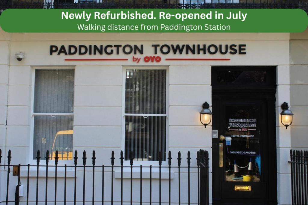 a building with a sign that reads paddington townhouse at Paddington Townhouse Hotel by OYO in London
