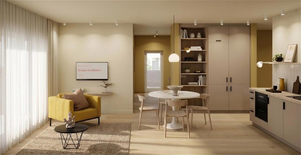 a kitchen and living room with a table and chairs at Gezeiten Suites Büsumer Deichhausen - Neueröffnung in Büsumer Deichhausen