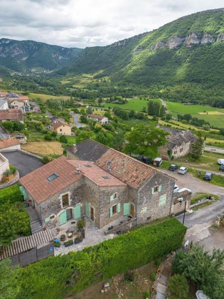 an aerial view of a house in the mountains at Gorge du Tarn Loft Cocoon Lesoleilo in Mostuéjouls