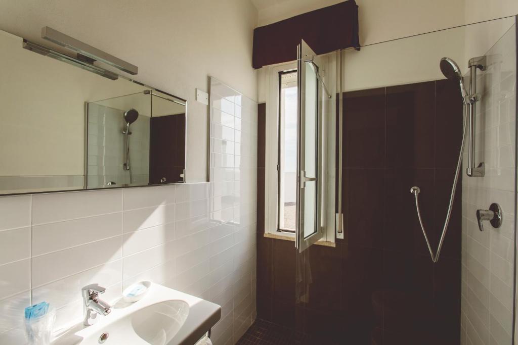 Koupelna v ubytování Hotel Marco