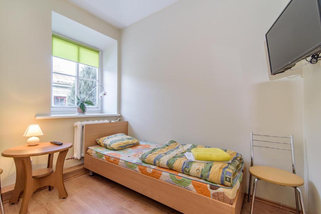Postel nebo postele na pokoji v ubytování Hostel Filaretai