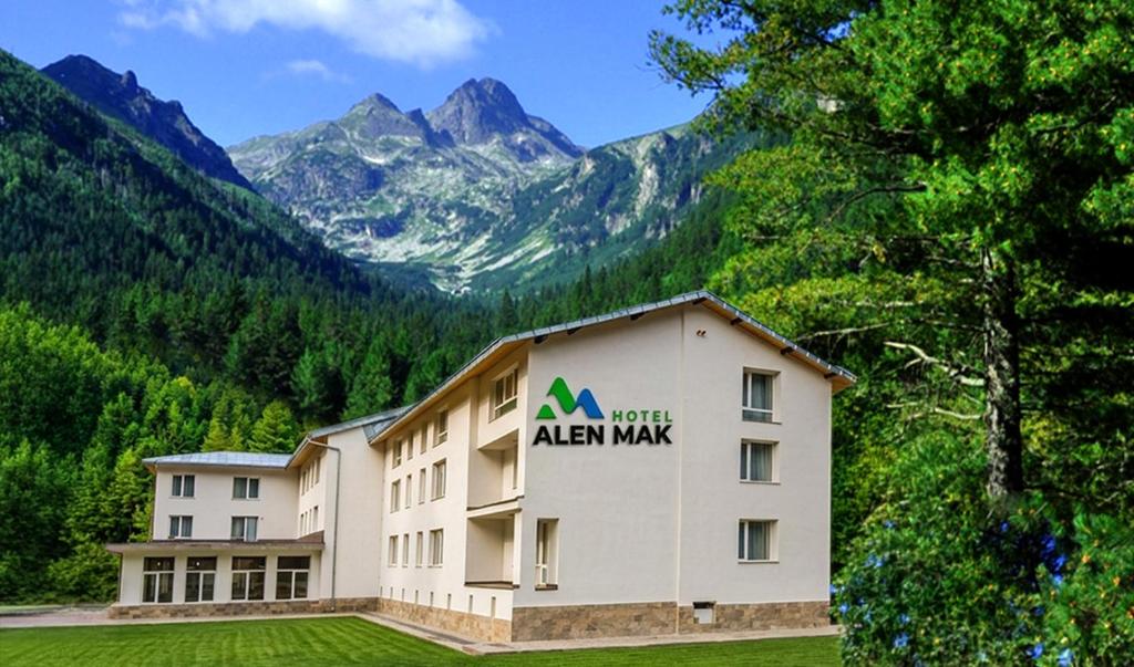 a view of a alfa way hotel with mountains in the background at Alen Mak in Govedartsi