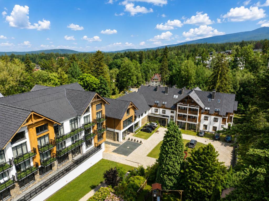 an aerial view of a house with a yard at Malina Resort & SPA in Szklarska Poręba