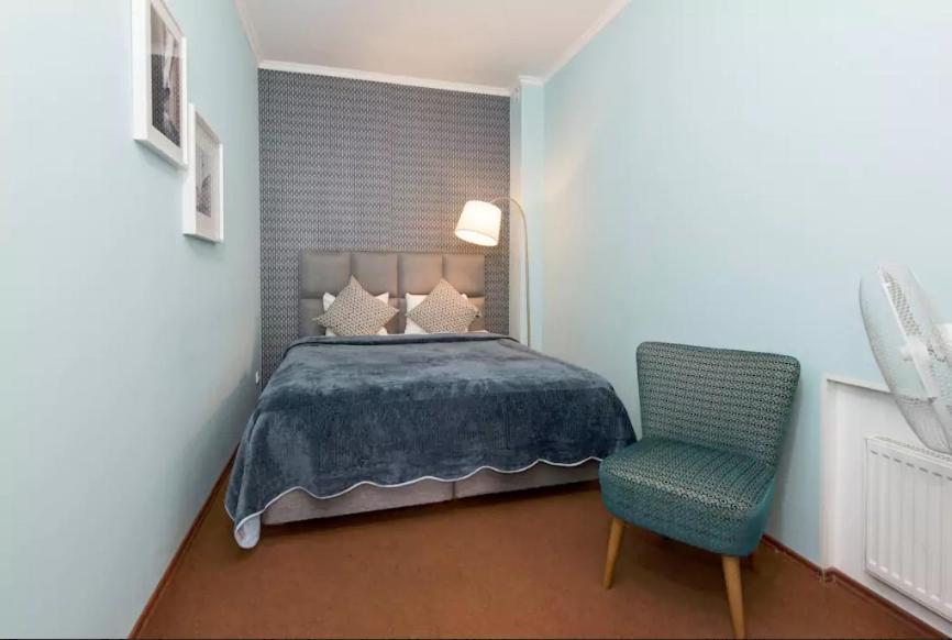 Postel nebo postele na pokoji v ubytování Tallinn City Apartments Residence
