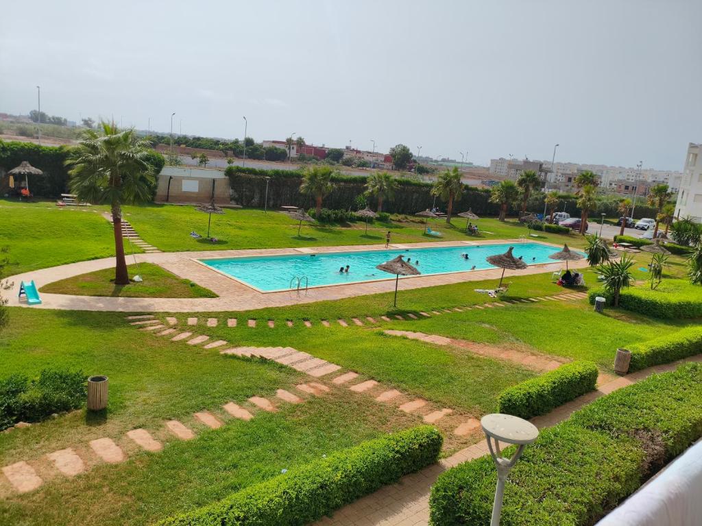a view of a swimming pool in a park at TAMARIs in Tamaris