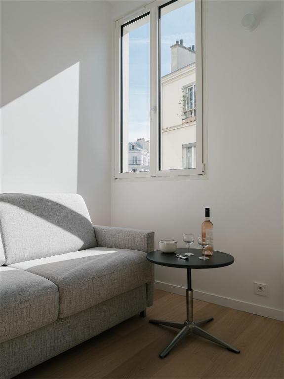 Cozy Bright Parisian Studio Belleville by Weekome