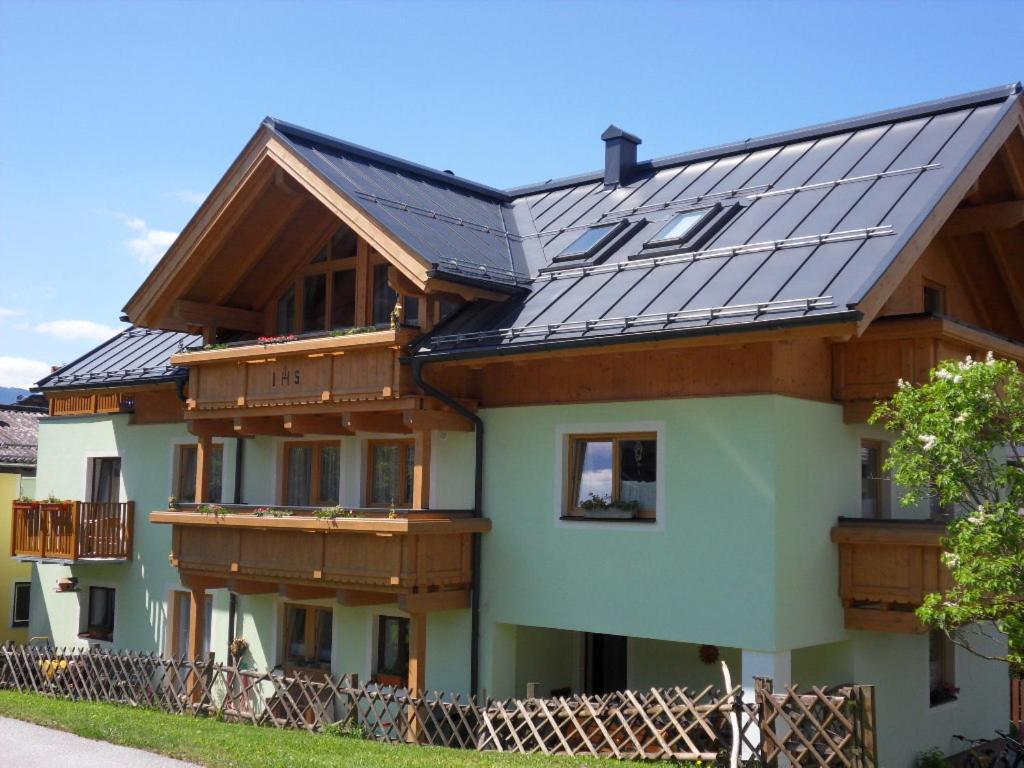 a house with solar panels on its roof at Haus Machreich in Maria Alm am Steinernen Meer