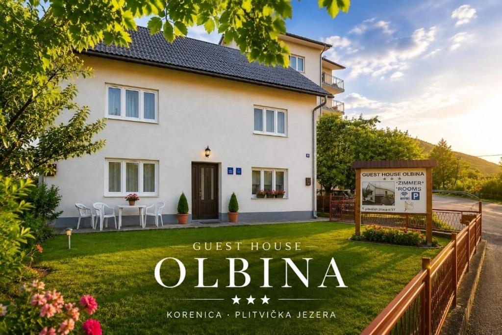 a villa with a guest house in obima at Guest House Olbina in Korenica