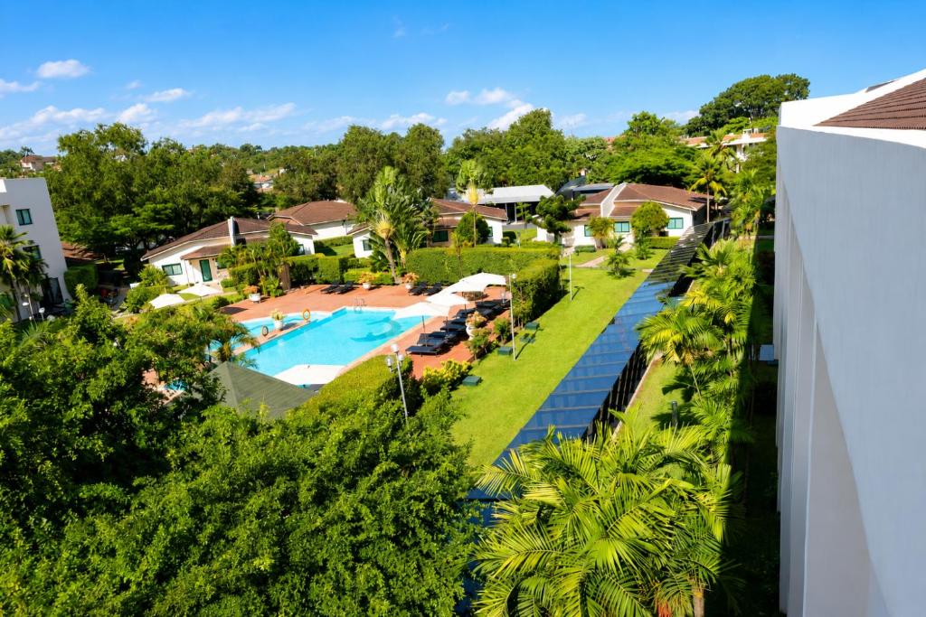 an aerial view of a resort with a swimming pool at Fiesta Royale Hotel in Accra