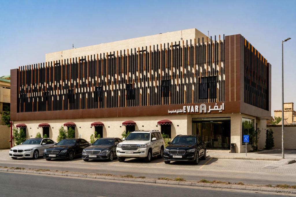 a group of cars parked in front of a building at فندق ايفر in Riyadh