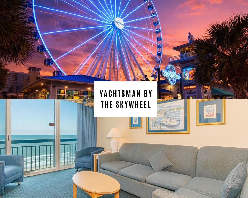 a living room with a couch and a ferris wheel at Yachtsman S406 2 BR in Myrtle Beach