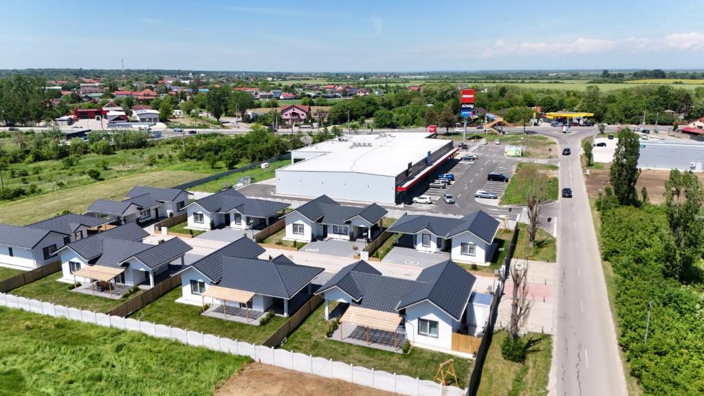 an overhead view of a row of houses in a suburb at Mimosa Villas in Ciolpani
