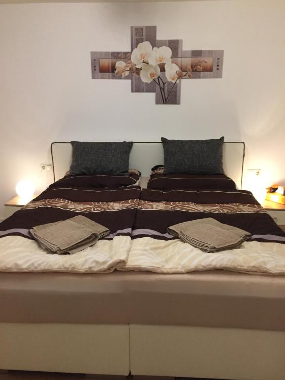 Cama ou camas em um quarto em Ferienwohnung Auszeit