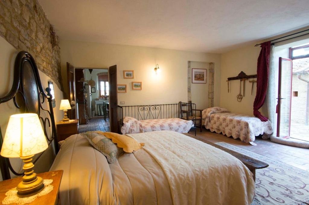 Postel nebo postele na pokoji v ubytování Il Vichiaccio Country House
