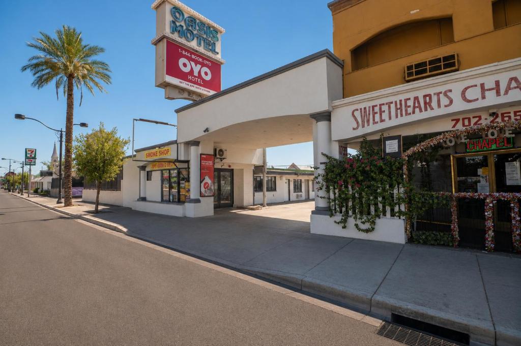 an empty street in front of a grocery store at OYO Oasis Motel Las Vegas I-15 in Las Vegas