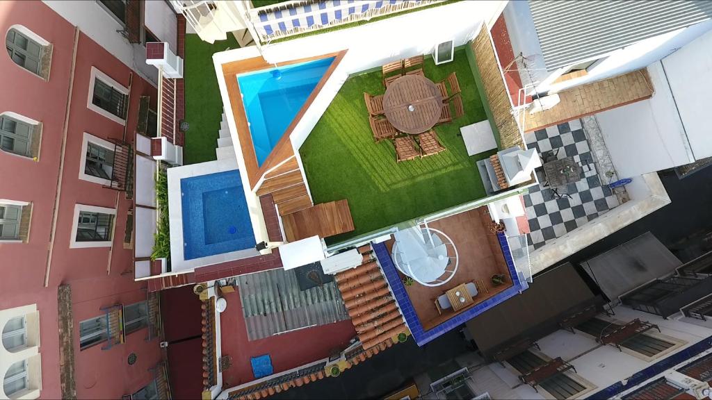 Część wypoczynkowa w obiekcie Casa con piscina junto catedral de sevilla