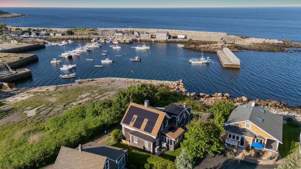 an aerial view of a harbor with boats in the water at The Rockporter in Rockport