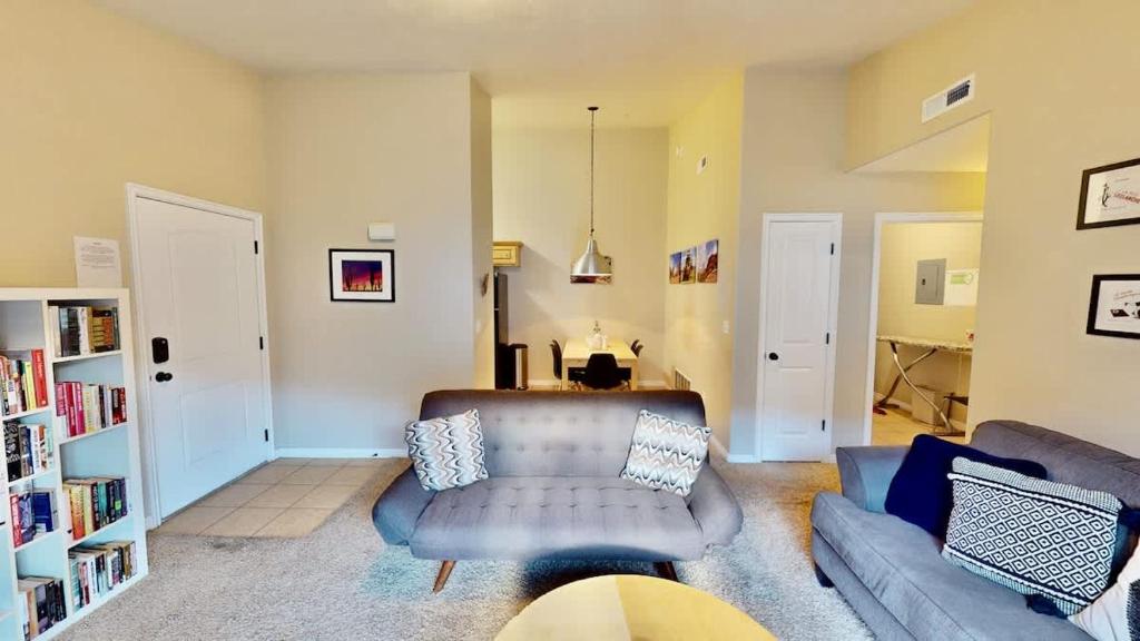 a living room with a couch and a chair at Red Cliff Condos #3i in Moab