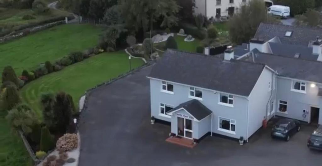 an aerial view of a white house at Corrib View Villa - Guest Accomodation in Cong