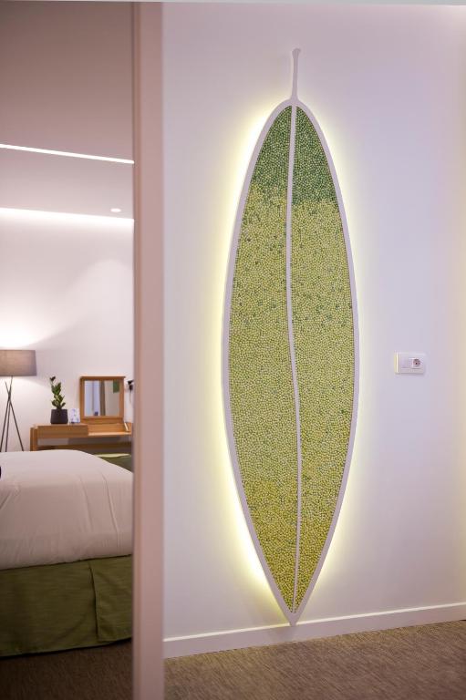 Posteľ alebo postele v izbe v ubytovaní NLH FIX | Neighborhood Lifestyle Hotels