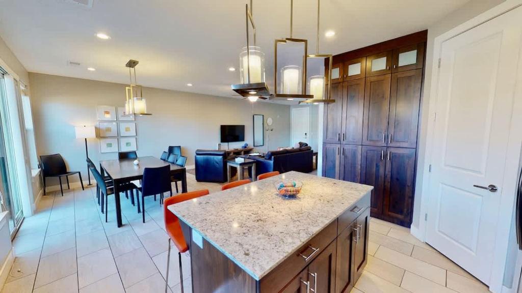 a living room with a kitchen and a dining room at Entrada at Moab #628 in Moab