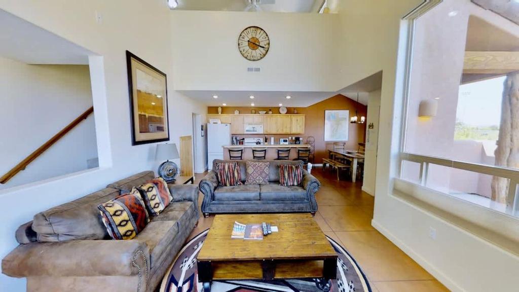 a living room with a couch and a table at Saddle Creek #3A1 in Moab