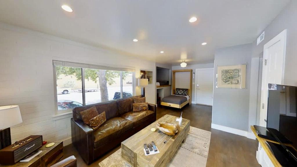 a living room with a couch and a coffee table at Moab Flats #8 in Moab