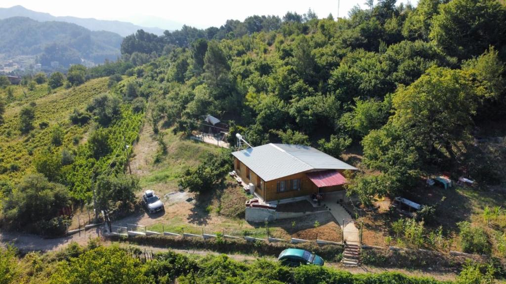 an aerial view of a house on a hill at Xhagolands in Përmet