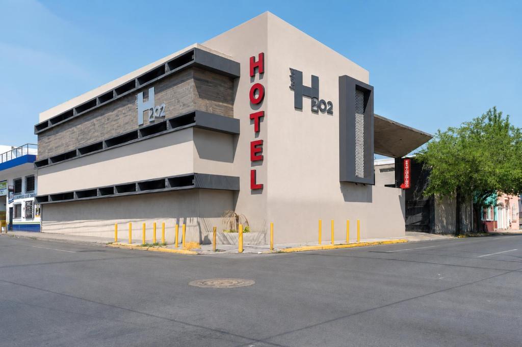 a building with a sign on the side of it at hotel 202 in Monterrey