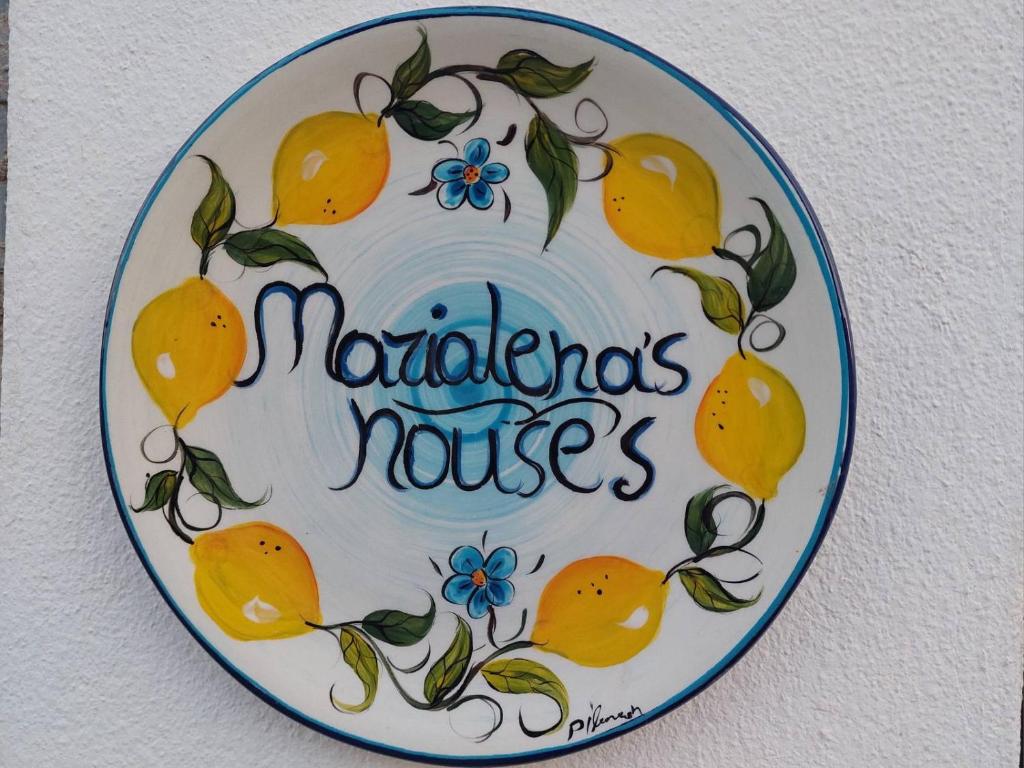 a plate with lemons and the words nederlands nurses at Marialena's houses in Methoni
