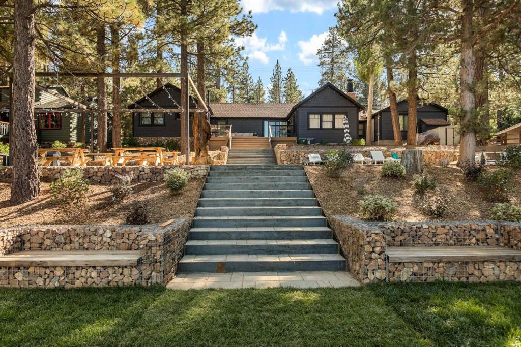 a set of stairs leading up to a house at Lakefront View Stunner in Big Bear Lake