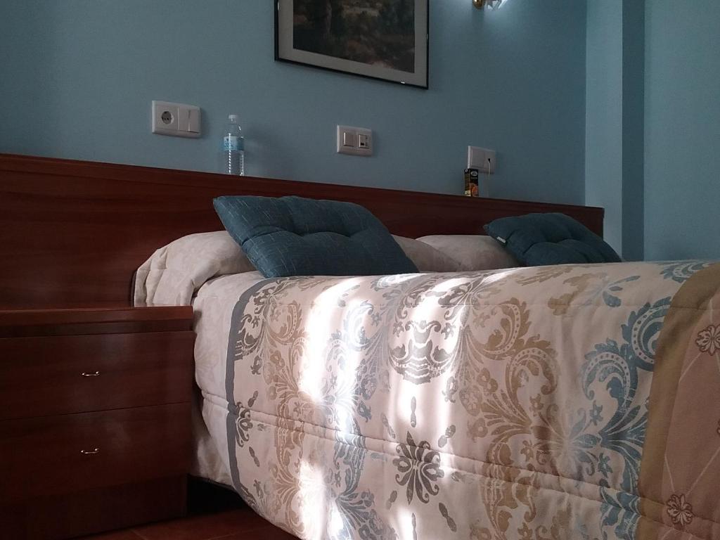 Posteľ alebo postele v izbe v ubytovaní Hostal Campus