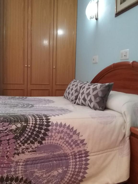 Posteľ alebo postele v izbe v ubytovaní Hostal Campus