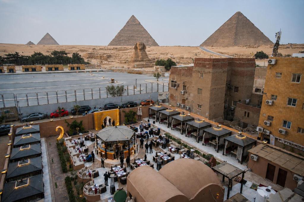 an aerial view of the pyramids of giza at Le Pacha Pyramids Hotel in Cairo