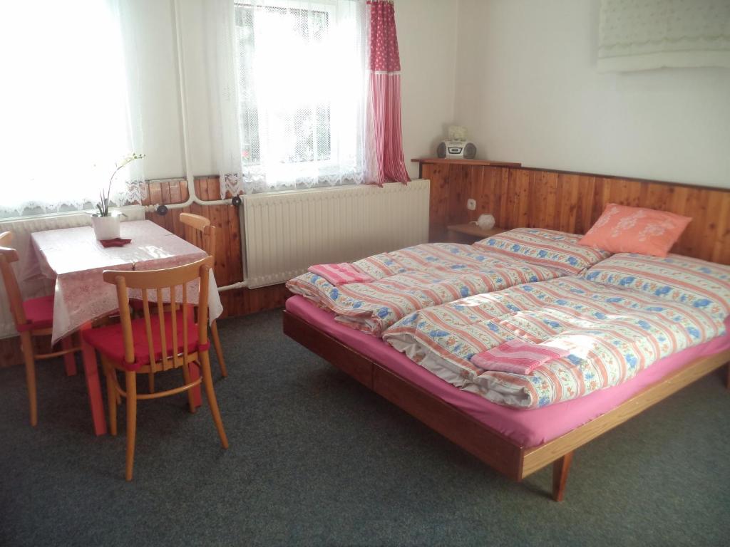 Postel nebo postele na pokoji v ubytování Benecko 131