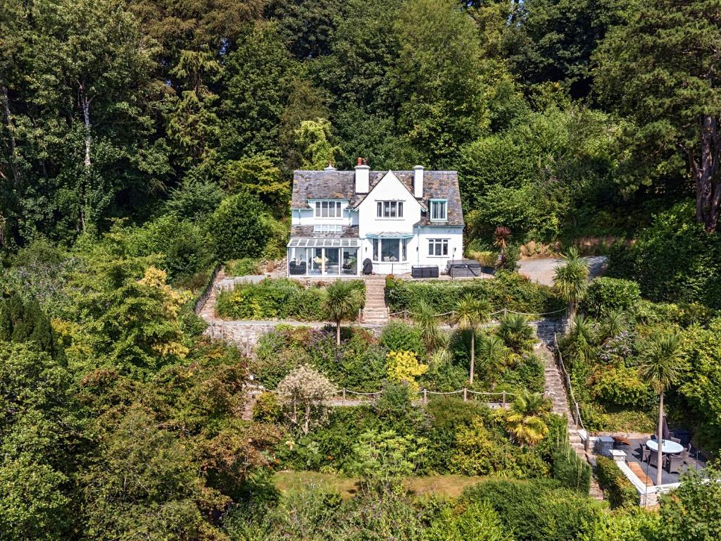 an aerial view of a house in the woods at Afallon in Menai Bridge