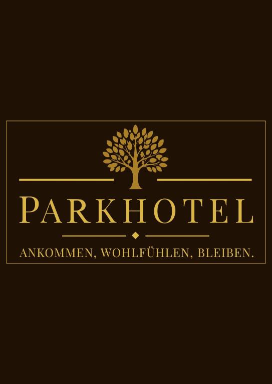 a logo for a hotel with a tree at Parkhotel Waldbreitbach in Waldbreitbach