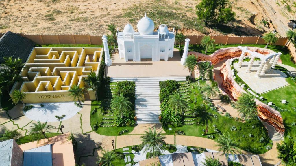 an aerial view of a mosque with palm trees at The Silkroad Mũi Né in Ấp Khánh Phước (1)