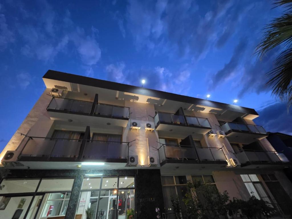 a building with lights on the side of it at Haciely Thermal Otel in Denizli
