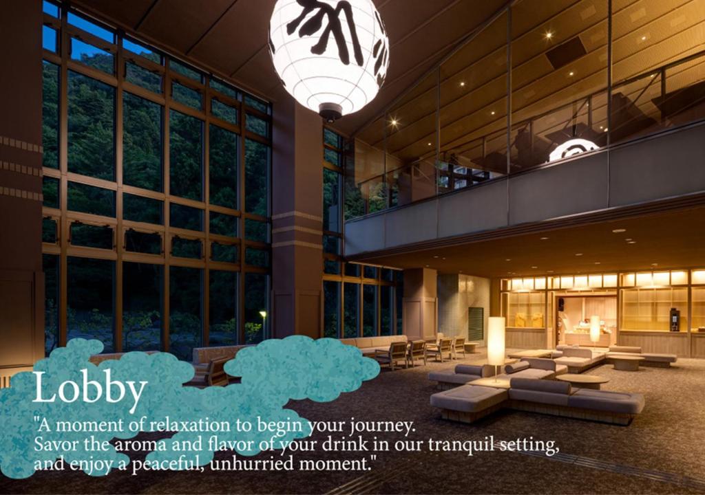 an advertisement for a building with a light hanging from it at KAMENOI HOTEL Arima in Kobe